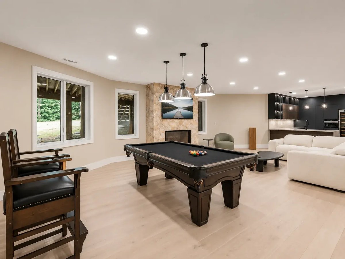 chinquapin-basement-remodel-billiards-area-stone-fireplace-lounge