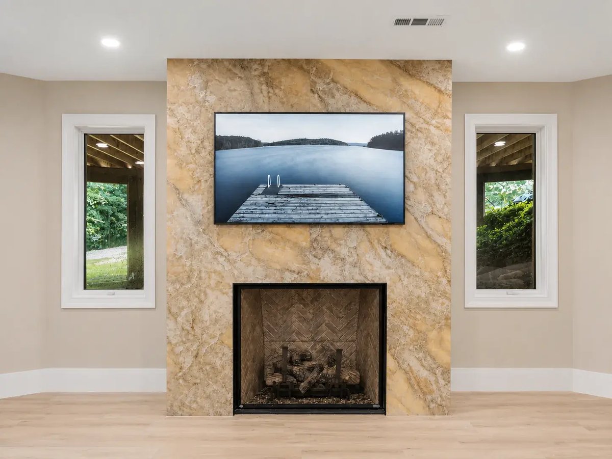 chinquapin-basement-remodel-stone-slab-fireplace-surround-feature-wall