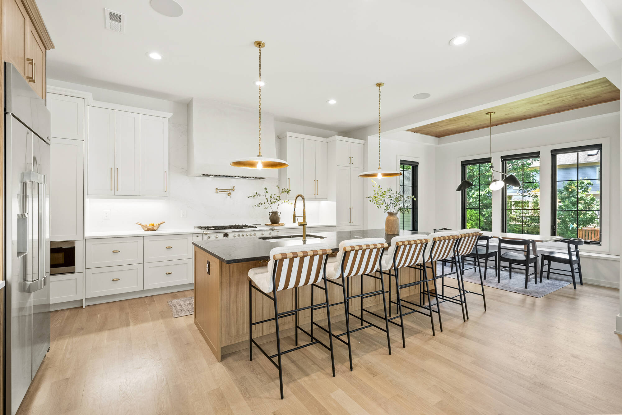 Custom kitchen remodel with oversized island and pendant lights by DesignLab in Washington, DC