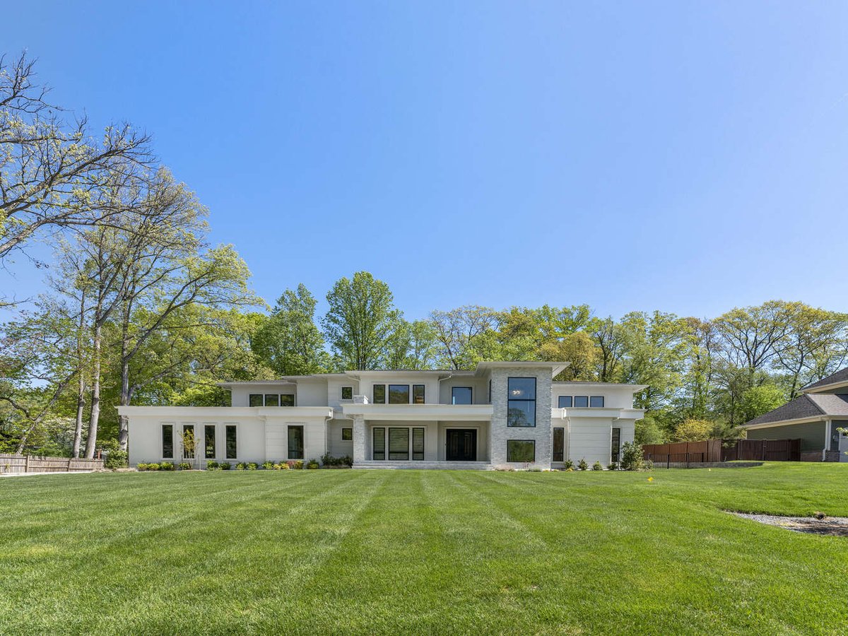 Front elevation showcasing sleek design and lawn space in a DesignLab home in Bethesda, MD