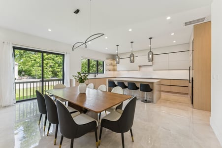 Sleek open-concept kitchen renovation with natural light by DesignLab in Bethesda, Maryland