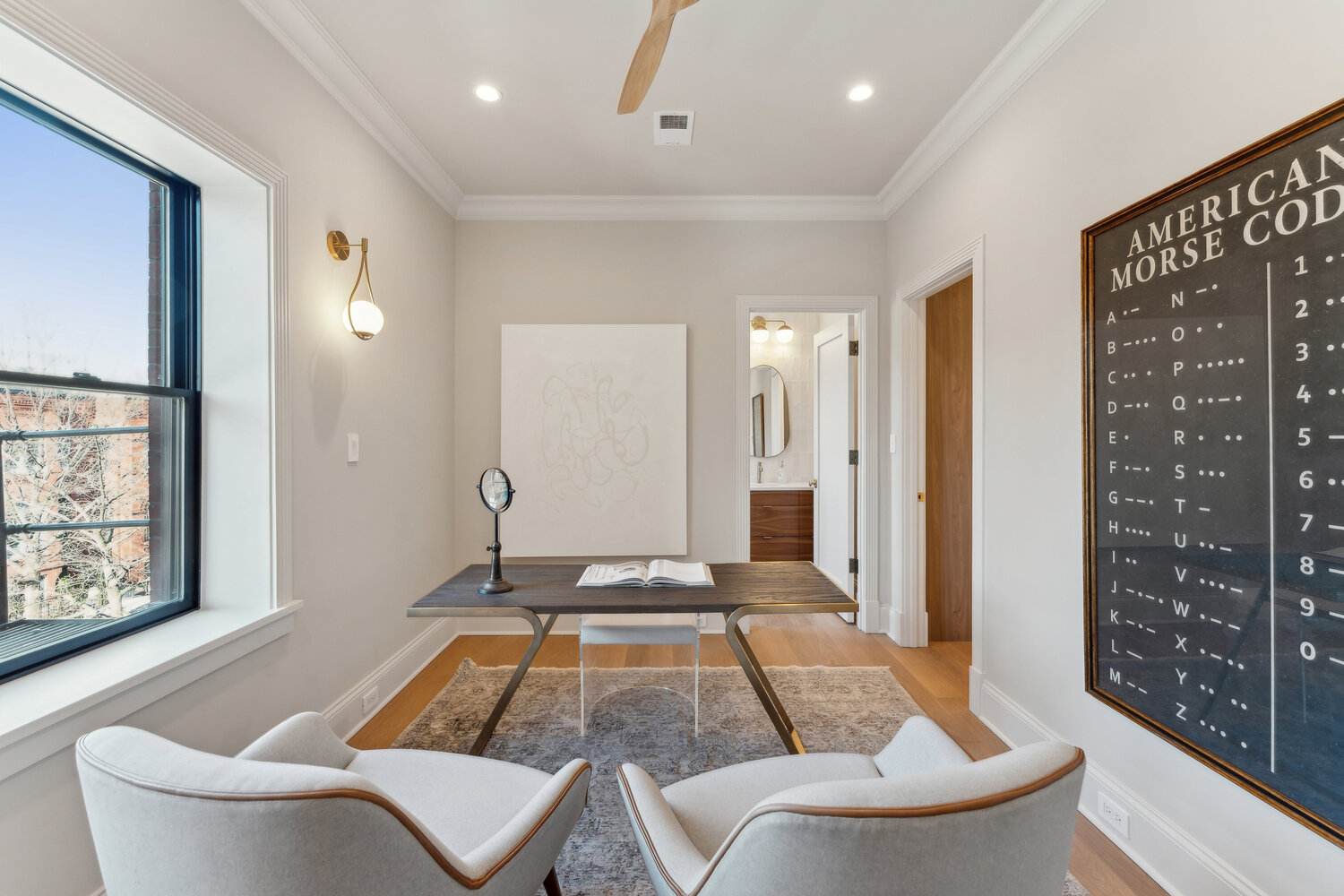 Minimalist home office with a modern desk and large Morse code artwork by DesignLab in Washington, DC