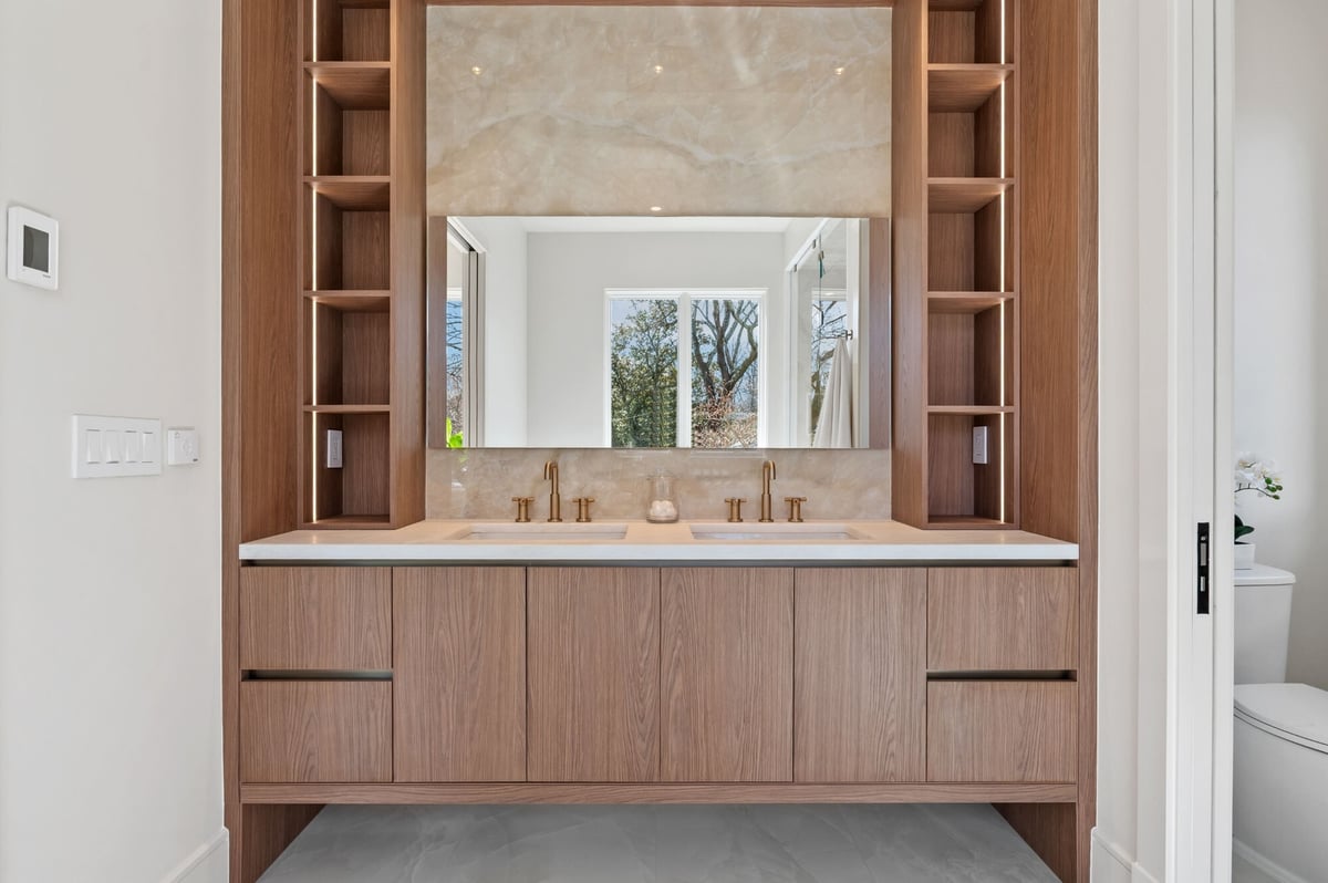 bathroom remodel with luxury stonework and millwork