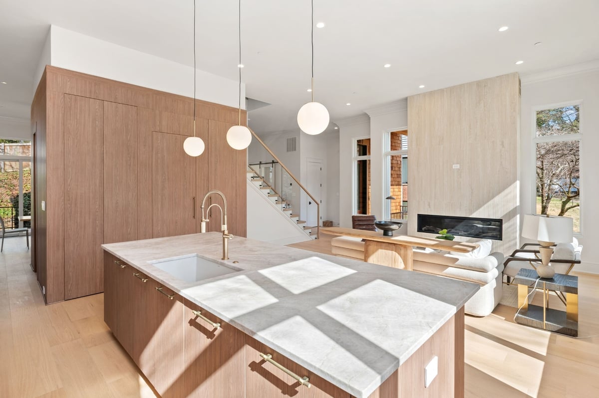 large kitchen island and wood cabinets in a luxury kitchen renovation in dc