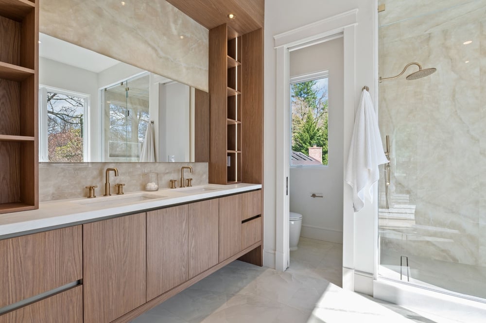 master suite remodel with custom stonework in bathroom