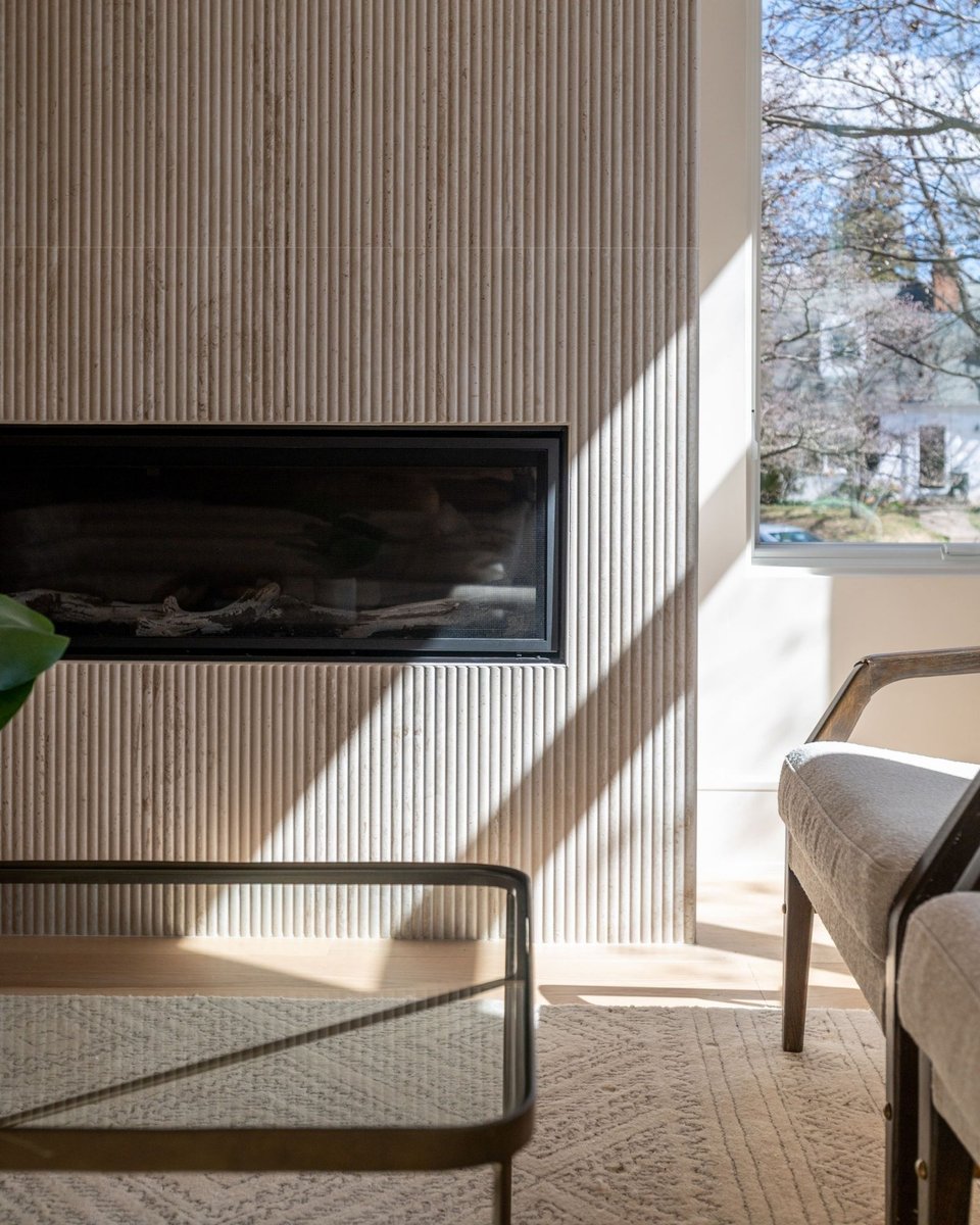 modern fireplace with fluted wood