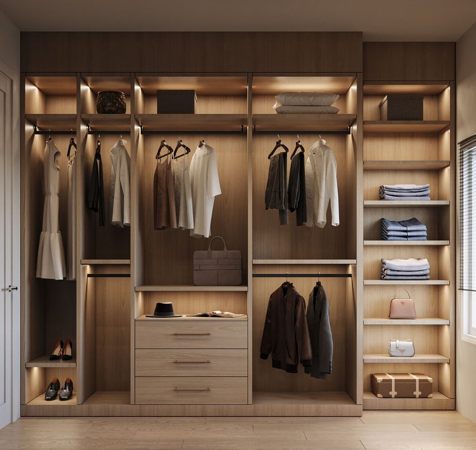 custom closet with layered lighting and wood built-ins