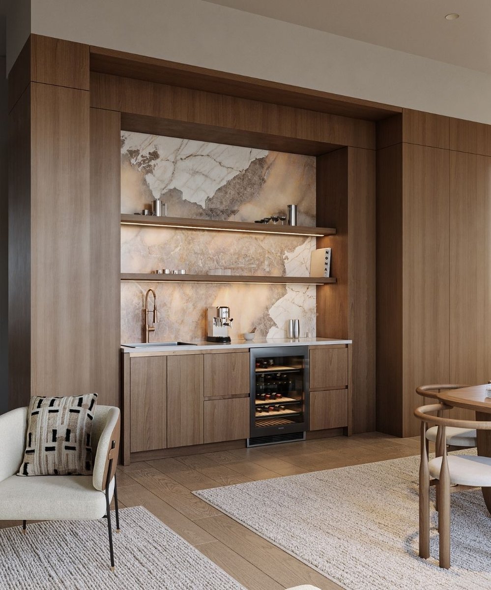 wet bar design with quartzite backsplash and mini fridge