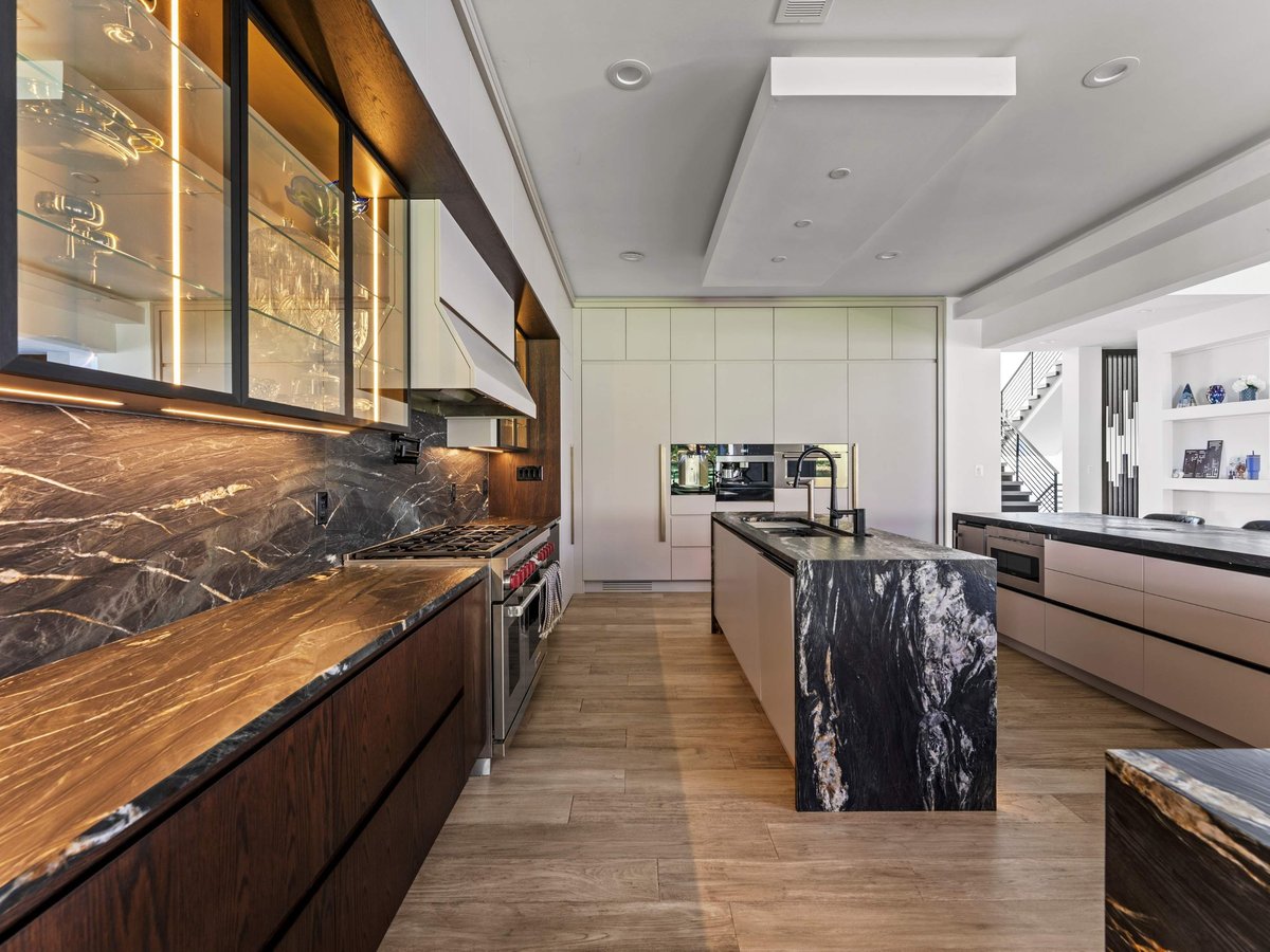 Dark neutral kitchen remodel in Mclean, VA with flat panel cabinets