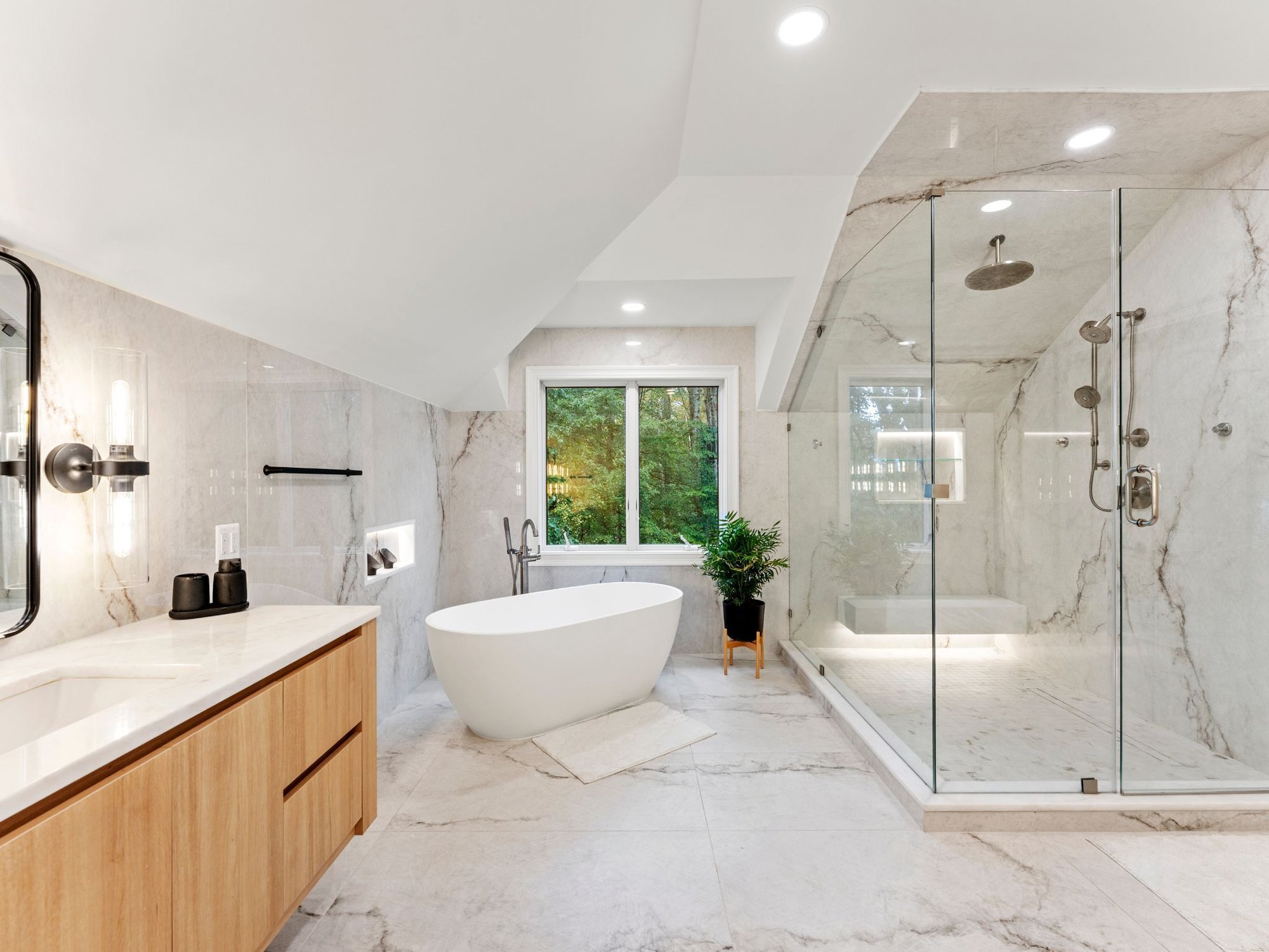 Luxury bathroom remodel in washington dc with large walk in shower, free standing tub, and large sink vanity