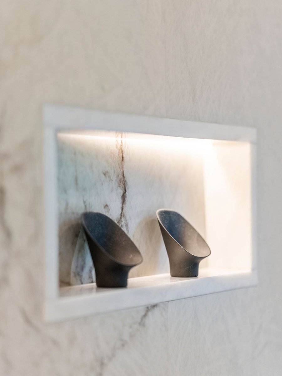 Luxury bathroom remodel in washington dc with stone sink and mirror (11)