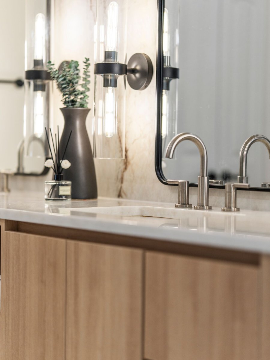 Luxury bathroom remodel in washington dc with stone sink and mirror (12)