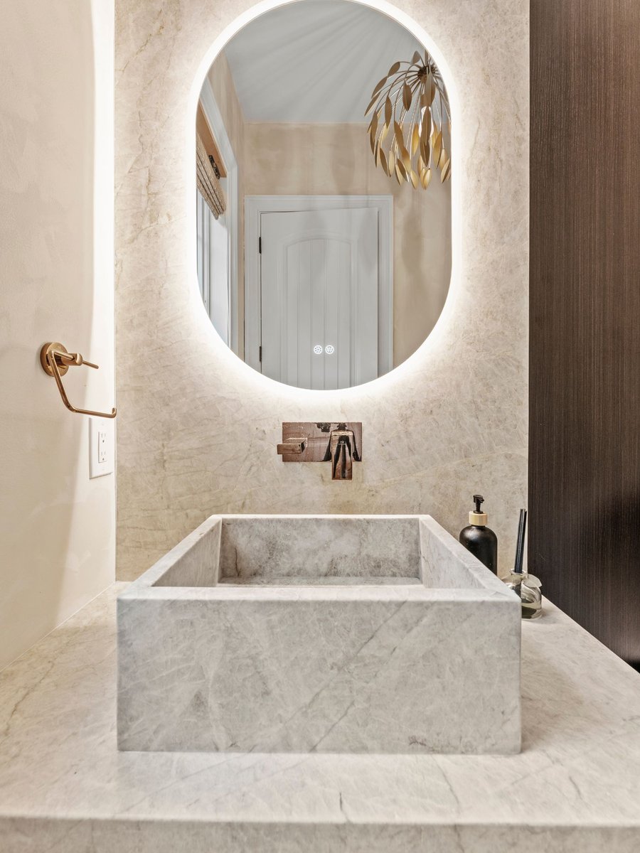 Luxury bathroom remodel in washington dc with stone sink and mirror (3)
