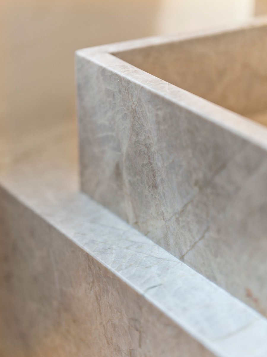 Luxury bathroom remodel in washington dc with stone sink and mirror (4)