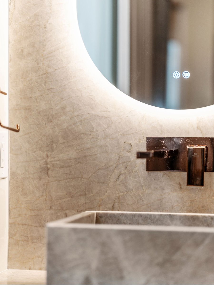 Luxury bathroom remodel in washington dc with stone sink and mirror (5)