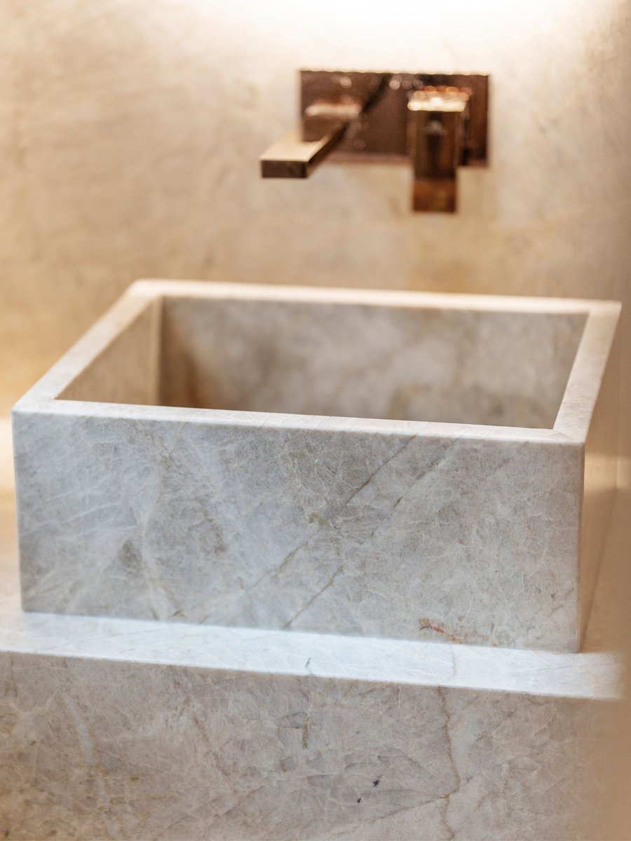 Luxury bathroom remodel in washington dc with stone sink and mirror (6)