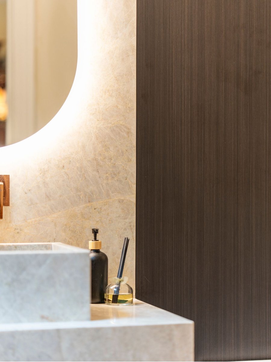 Luxury bathroom remodel in washington dc with stone sink and mirror (7)