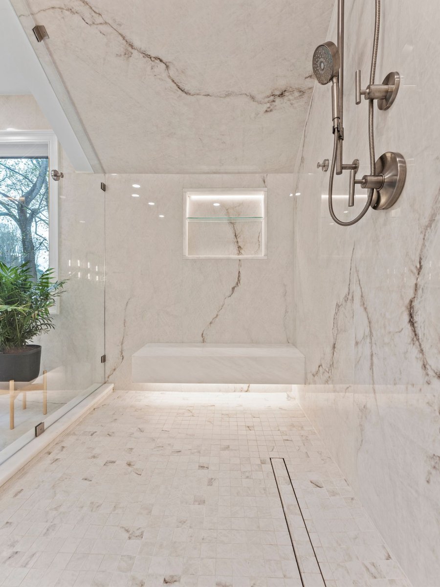 Luxury bathroom remodel in washington dc with stone sink and mirror (8)