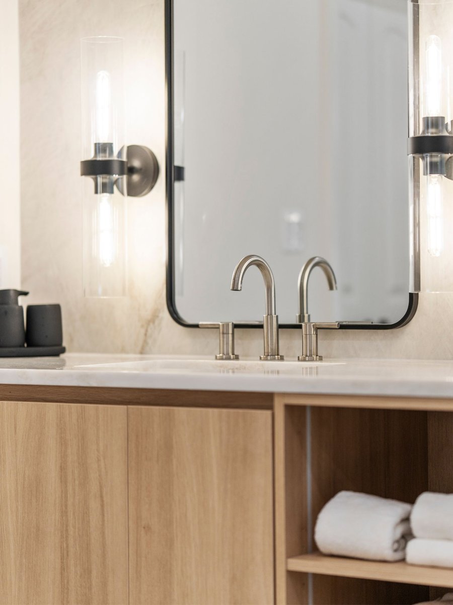 Luxury bathroom remodel in washington dc with stone sink and mirror (9)