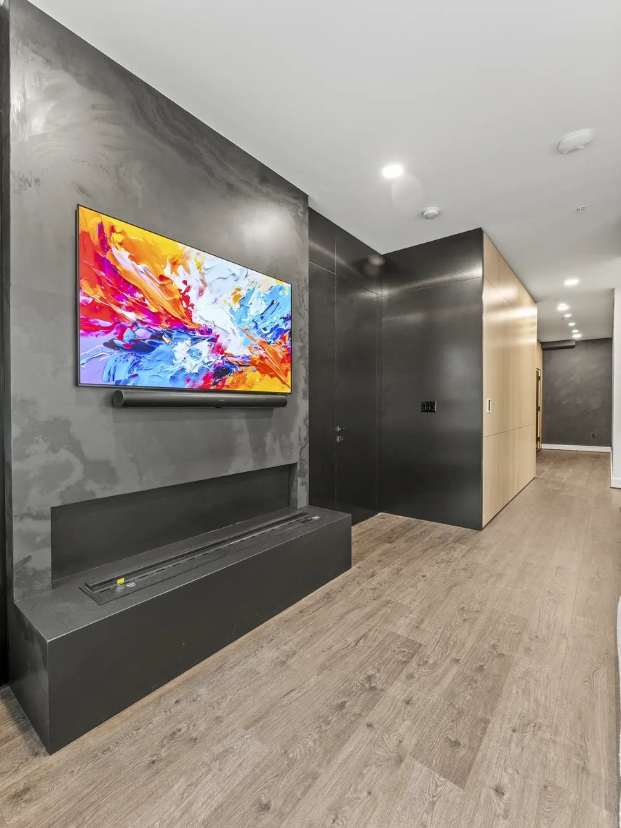 slater-condo-remodel-linear-fireplace-black-plaster-feature-wall