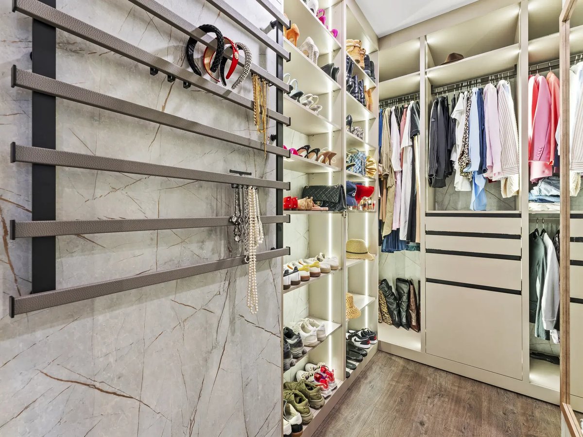 slater-condo-remodel-walk-in-closet-jewelry-wall-lit-shelving