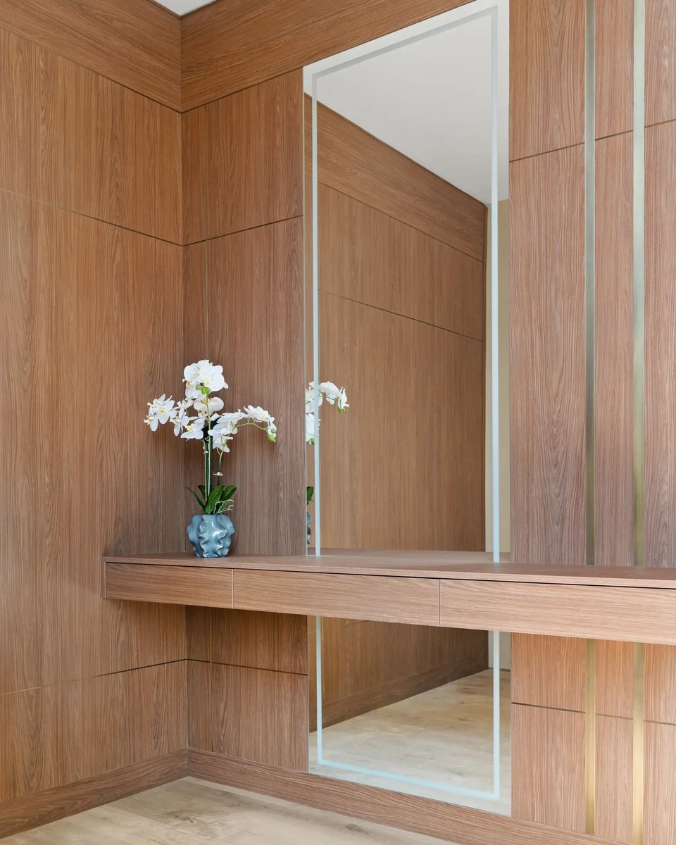 506-stephen-circle-entry-foyer-floating-walnut-console-orchids