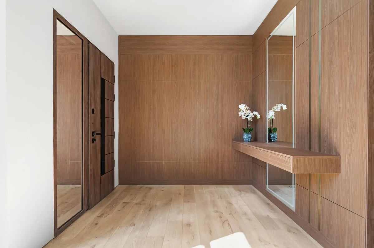 506-stephen-circle-entry-foyer-walnut-paneled-wall-front-door