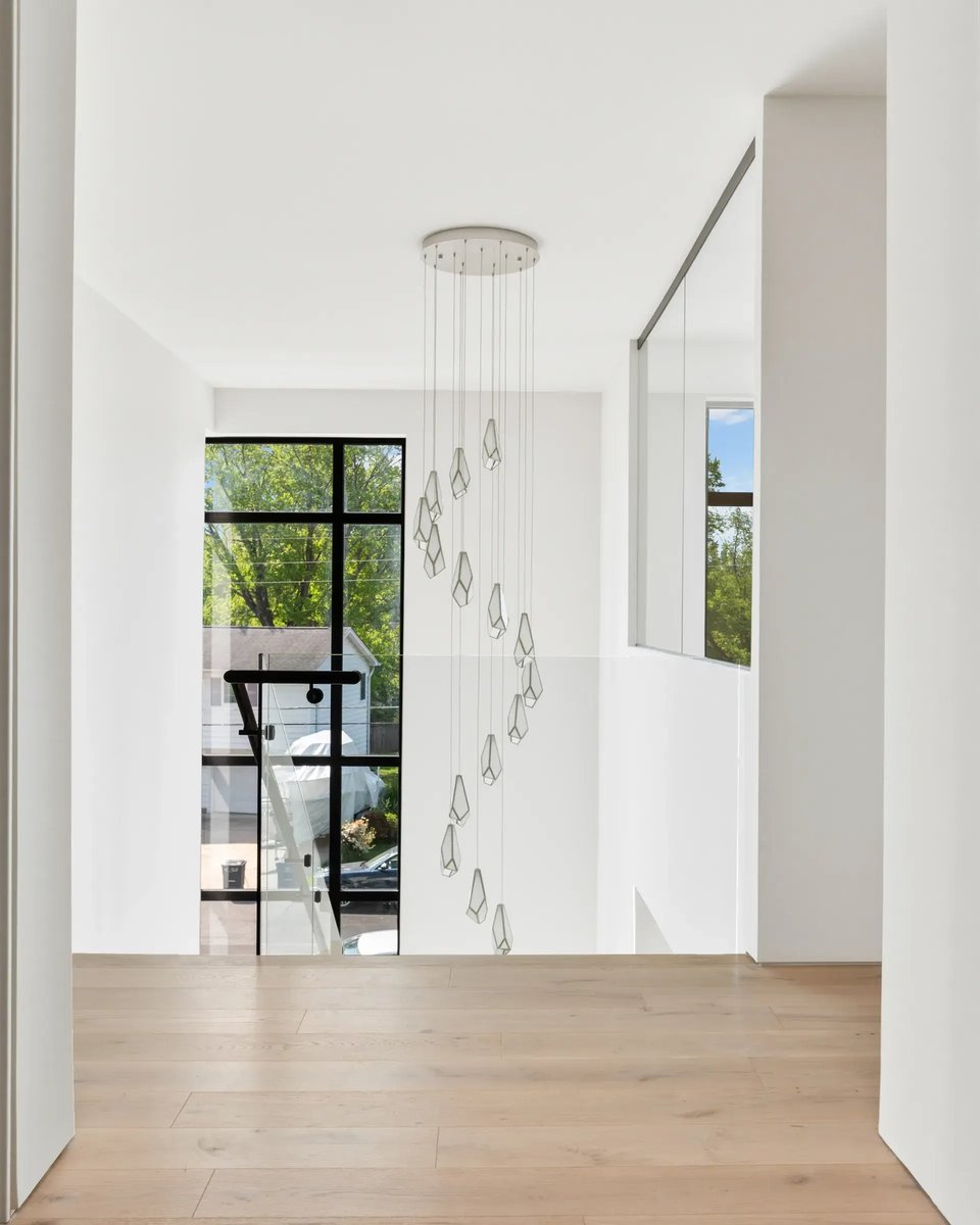 506-stephen-circle-two-story-stairwell-cascading-chandelier