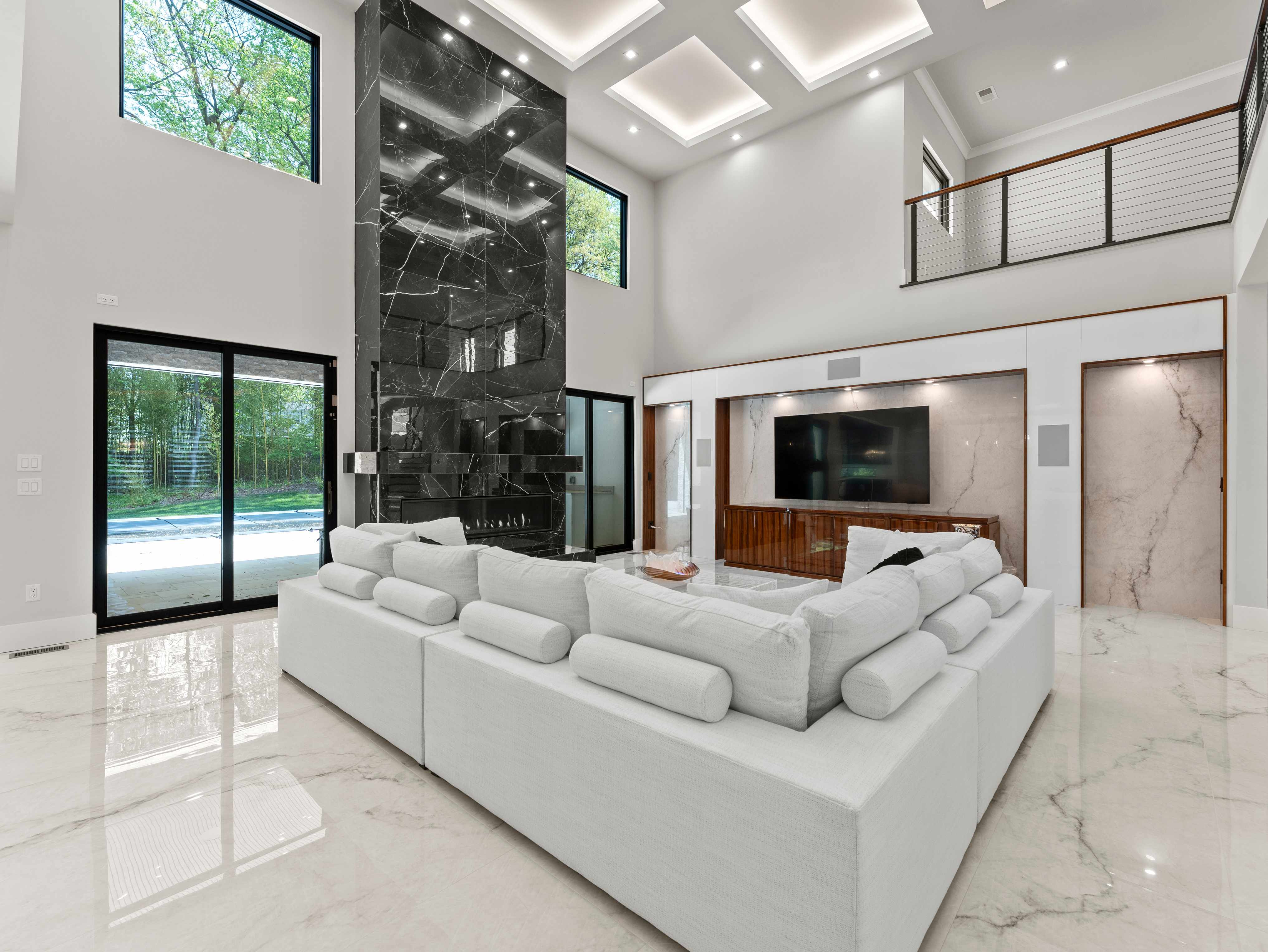 Stone Fireplace and Mantle with Modern White Sectional Couch
