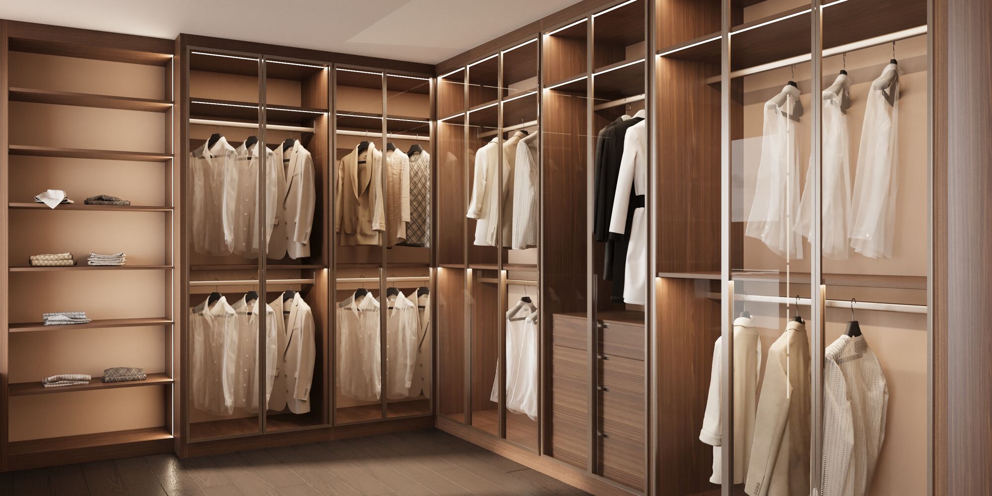 Sophisticated women’s closet with glass doors and LED lighting in a custom home by DesignLab in Vienna, VA