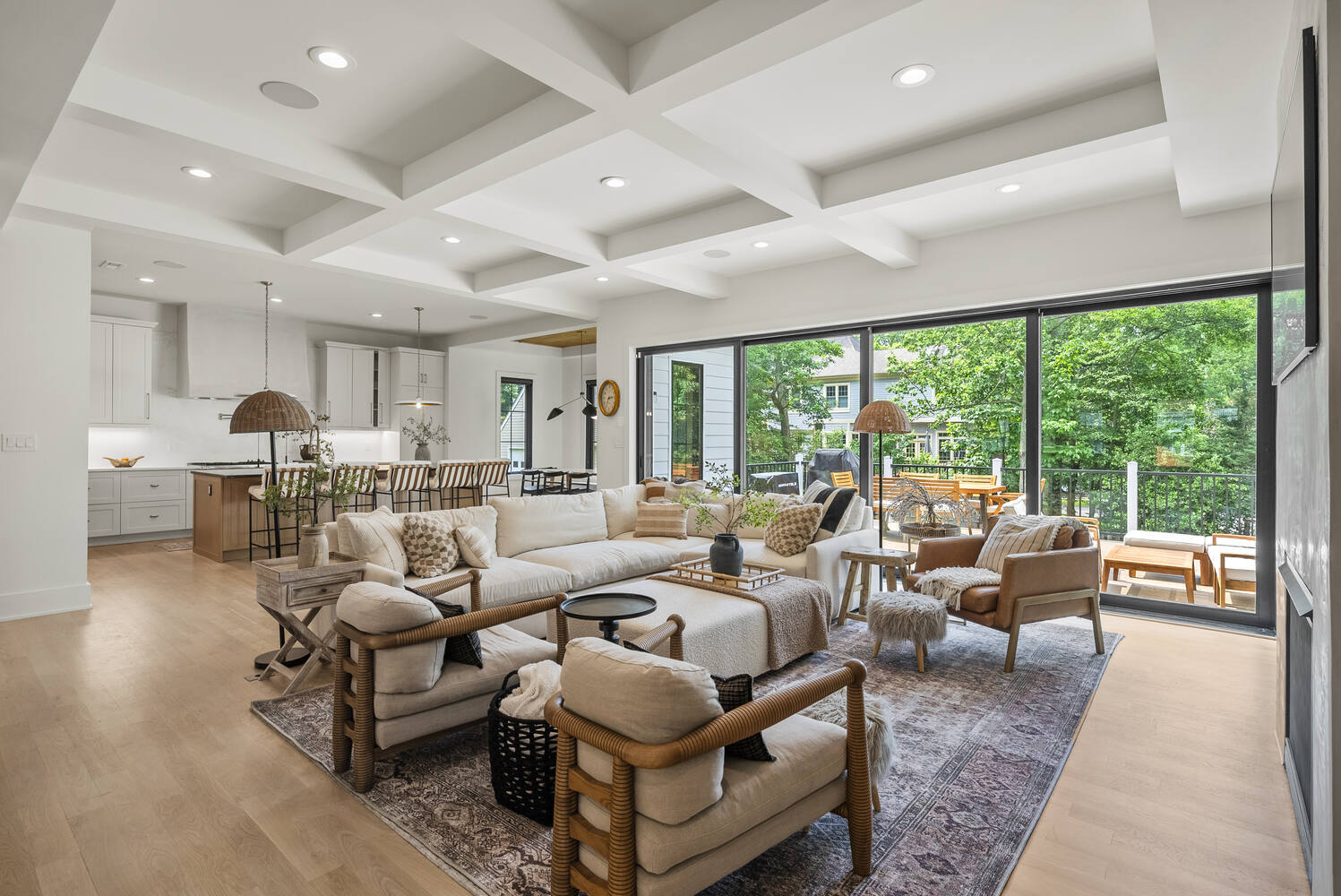 Indoor-outdoor living design with spacious seating by DesignLab in a Metro Washington custom home